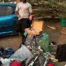 Volunteer with donated equipment from a community drive